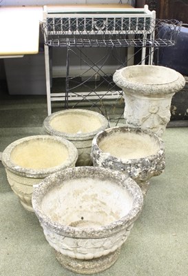 Lot 509 - A pair of reconstituted stone planters, each...