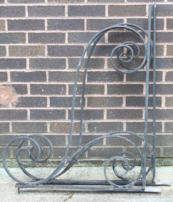 Lot 510 - A pair of large wrought iron brackets of...