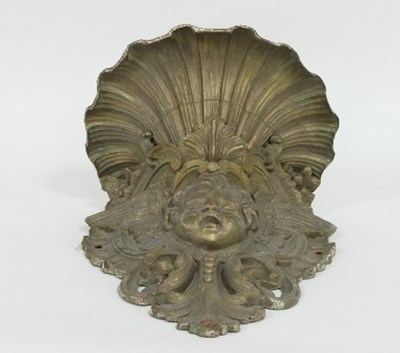 Lot 513 - A gilt metal holy water stoop, of shell form...