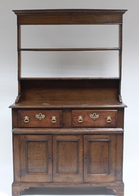 Lot 515 - An oak dresser fitted two short drawers with...