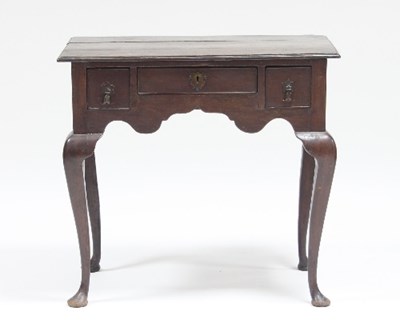 Lot 530 - A George III 18th Century oak three-drawer...