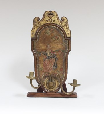 Lot 532 - A walnut and parcel gilt wall sconce, the...