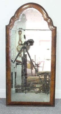 Lot 535 - A 18th Century walnut mirror with shaped...