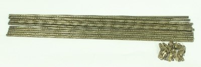 Lot 563 - A collection of thirteen brass stair rods cast...