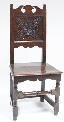 Lot 574 - A 17th Century oak chair with shaped pierced...