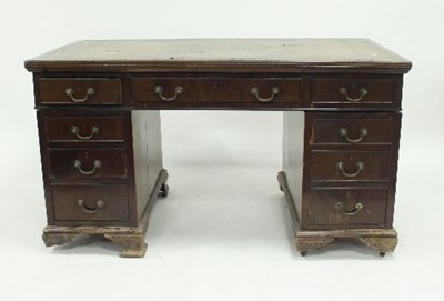 Lot 583 - An Edwardian pedestal desk with leather set...