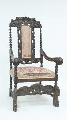 Lot 584 - A Charles II style armchair with carved and...