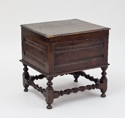 Lot 590 - A 17th Century oak commode box with panelled...