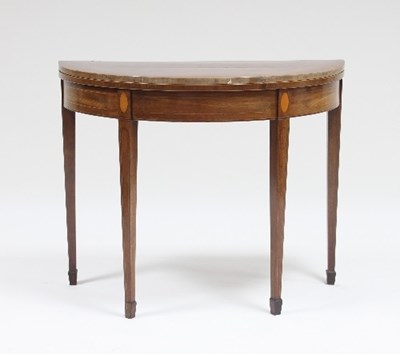 Lot 593 - A George III mahogany semi-circular card table...