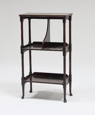 Lot 595 - A mahogany three-tier dwarf bookcase on turned...