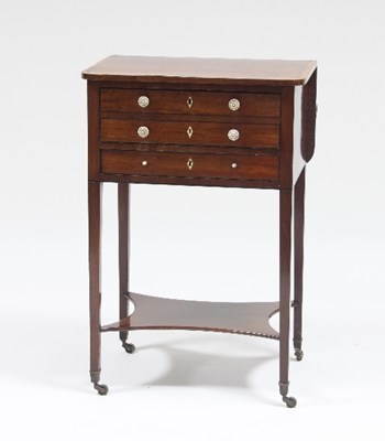 Lot 597 - A Regency mahogany worktable with crossbanded...