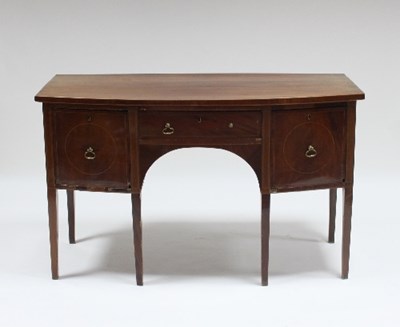 Lot 601 - A George III mahogany bow fronted sideboard...