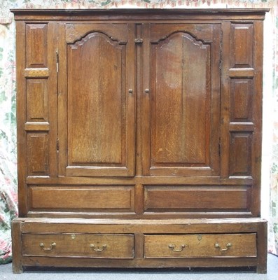 Lot 603 - A mid 18th Century oak cupboard, the moulded...