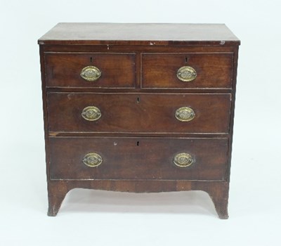 Lot 609 - A Regency mahogany chest of drawers of two...