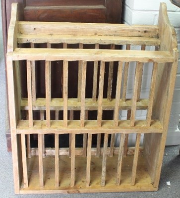 Lot 615 - A pine plate rack with dowel divisions, 63cm wide