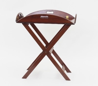 Lot 644 - A mahogany butler's tray on a later stand,...