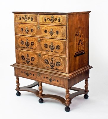 Lot 650 - A William and Mary walnut chest on stand, the...