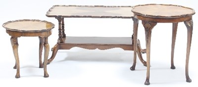 Lot 660 - A walnut coffee table, the rectangular top...