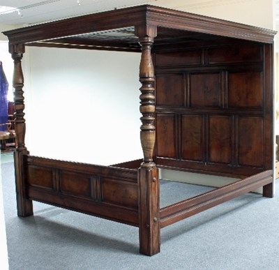 Lot 673 - A 20th Century cherrywood four-poster bed with...