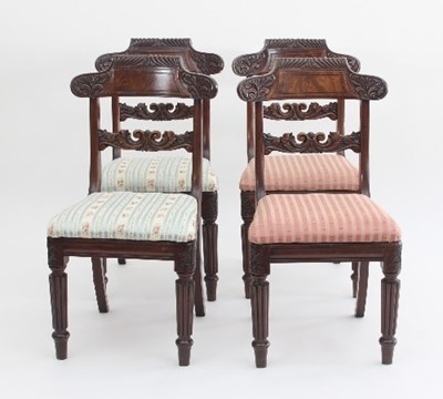 Lot 674 - A set of four mahogany dining chairs, early...