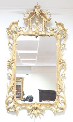 Lot 684 - A George III style carved and gilded wall...