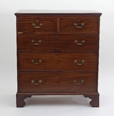 Lot 692 - A George III mahogany chest of two short over...