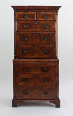 Lot 698 - A George I style walnut chest on chest, with...