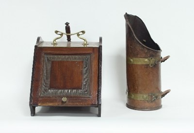 Lot 702 - A mahogany coal scuttle and copper scoop