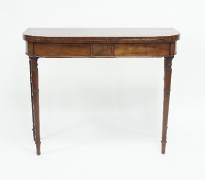 Lot 707 - A mahogany D-shaped tea table on turned...