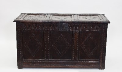 Lot 709 - A late 17th Century oak coffer carved diapers...