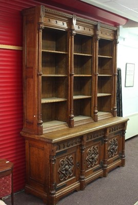 Lot 712 - A Victorian Gothic revival oak library...