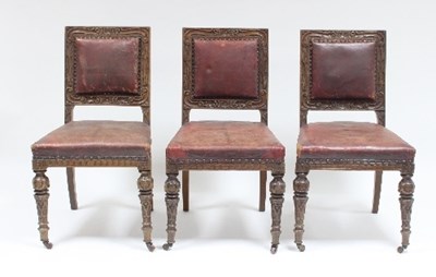 Lot 713 - Thirteen late 19th Century oak dining chairs...