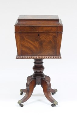 Lot 724 - A Regency mahogany teapoy, the hinged cover...