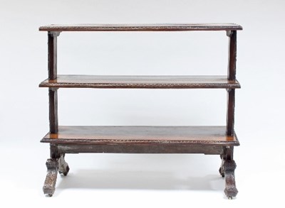 Lot 726 - A late Victorian three-tier oak buffet, the...