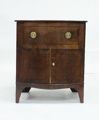 Lot 729 - A mahogany bowfront cupboard with drawer over,...