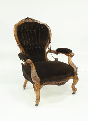 Lot 731 - A Victorian carved walnut chair, with deep...