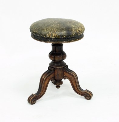 Lot 752 - A Victorian walnut piano stool with...