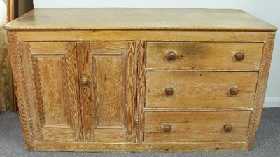 Lot 761 - A pine dresser fitted three drawers and a...