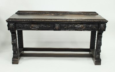 Lot 762 - A carved oak side table, 152.5cm wide