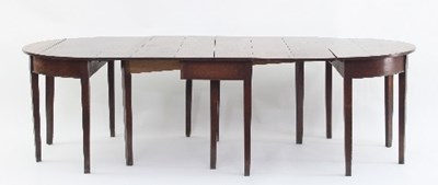 Lot 771 - An early 19th Century oak dining table, with D-...