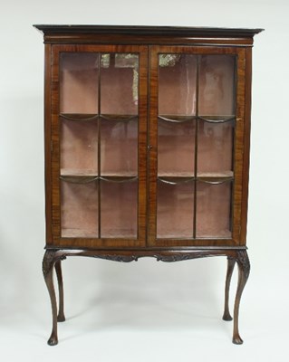 Lot 775 - A mahogany display cabinet enclosed by a pair...