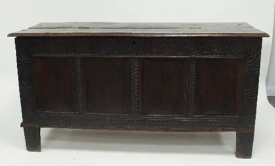 Lot 786 - An 18th Century oak coffer, the hinged lid...