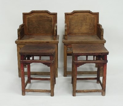 Lot 801 - A pair of Chinese armchairs with panel backs...