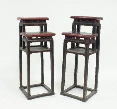 Lot 802 - A near pair of Chinese lacquered two-tier...