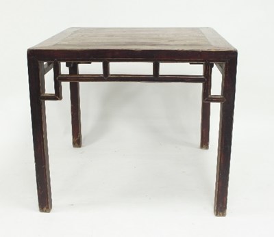 Lot 805 - A Chinese elm table, the square top above a...