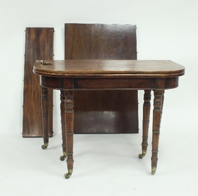 Lot 809 - A Regency mahogany extending dining table,...