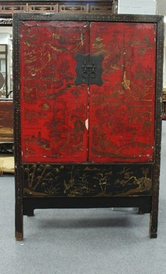 Lot 811 - A Chinese lacquered cupboard enclosed by two...