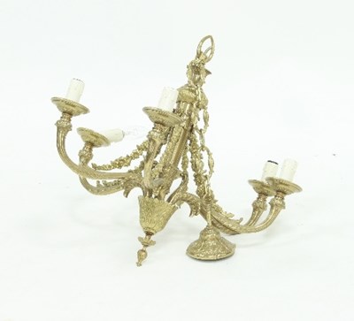 Lot 817 - A gilt metal six-branch chandelier, the...