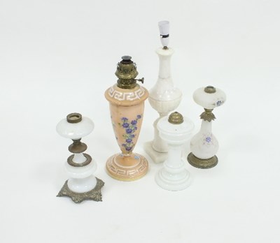 Lot 820 - A Victorian opaque glass oil lamp painted...