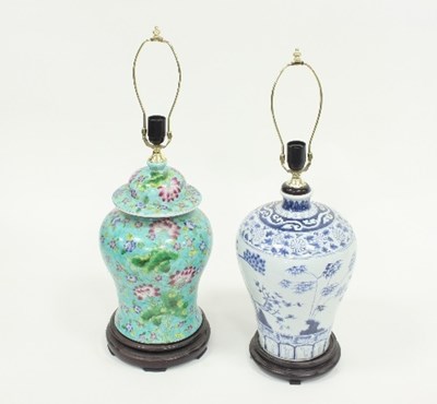 Lot 821 - A Chinese style blue and white baluster vase...